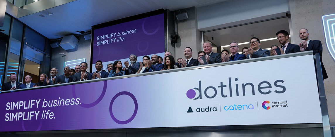 The team celebrating on the balcony at LSEG during the welcome ceremony.