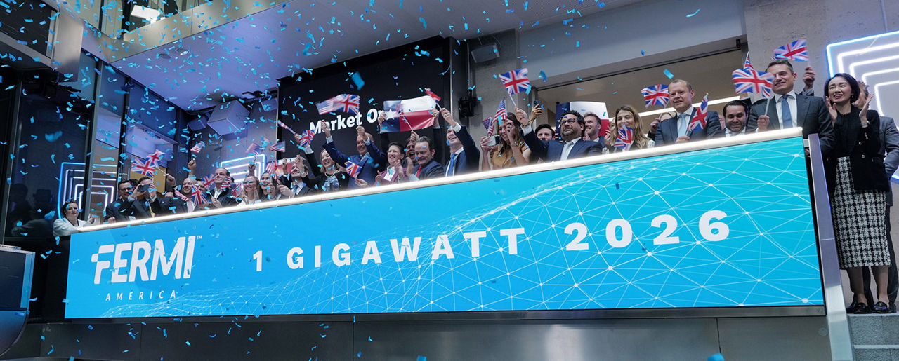 The team celebrating on the balcony at LSEG during the welcome ceremony.