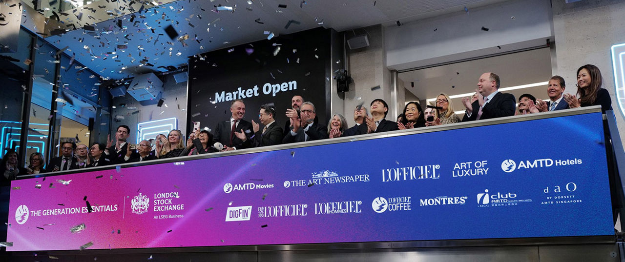 The team celebrating on the balcony at LSEG during the welcome ceremony.