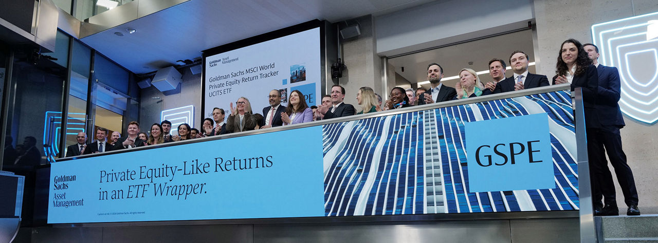 The team celebrating on the balcony at LSEG during the welcome ceremony.