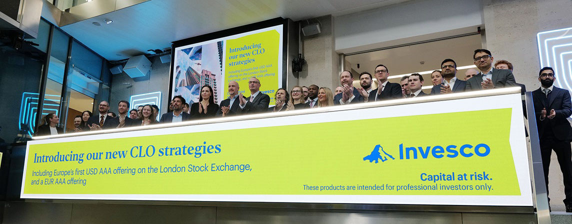 The team celebrating on the balcony at LSEG during the welcome ceremony.