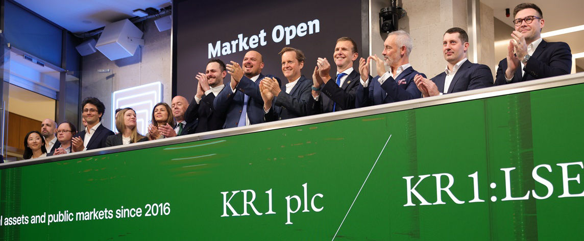 The team celebrating on the balcony at LSEG during the welcome ceremony.