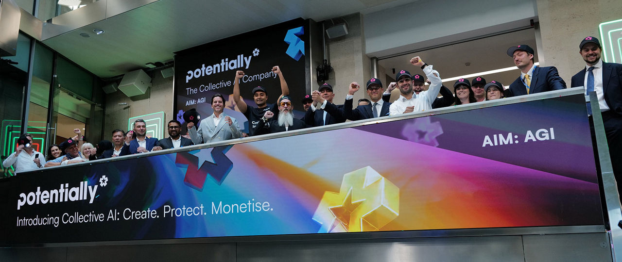 The team celebrating on the balcony at LSEG during the welcome ceremony.